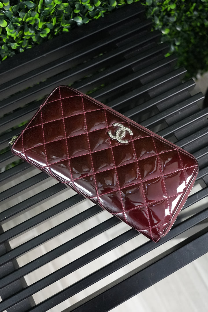 Chanel Burgundy quilted patent zippy