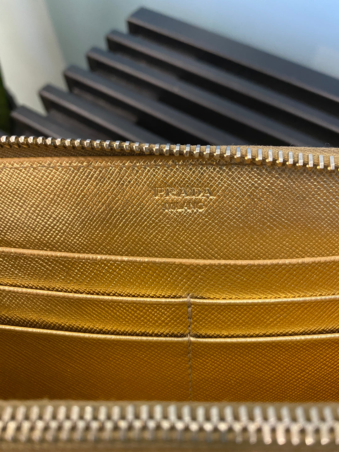 Prada Bronze Saffiano Zippy Wallet (5612)