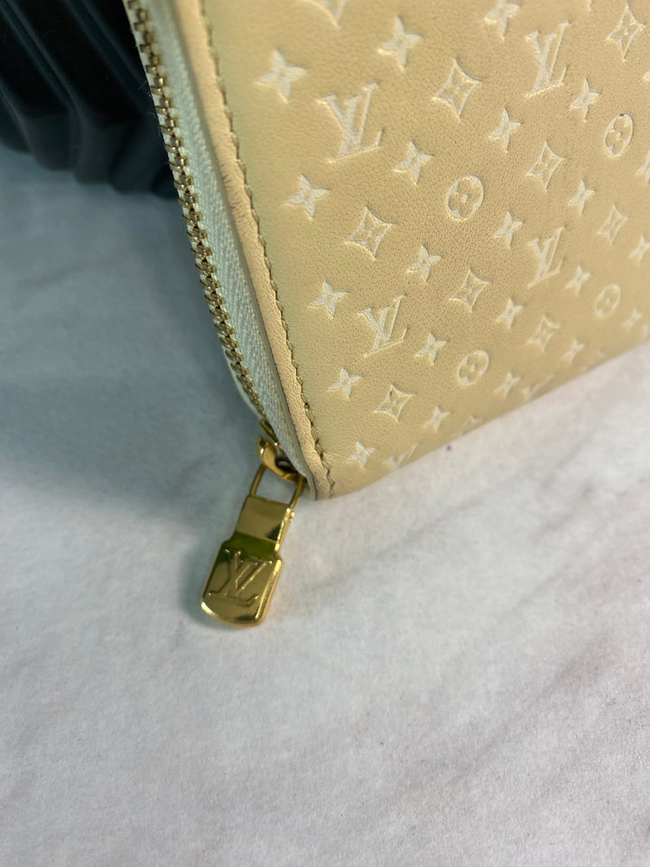 Louis Vuitton Calfskin Nanogram Embossed Zippy Wallet (0504)