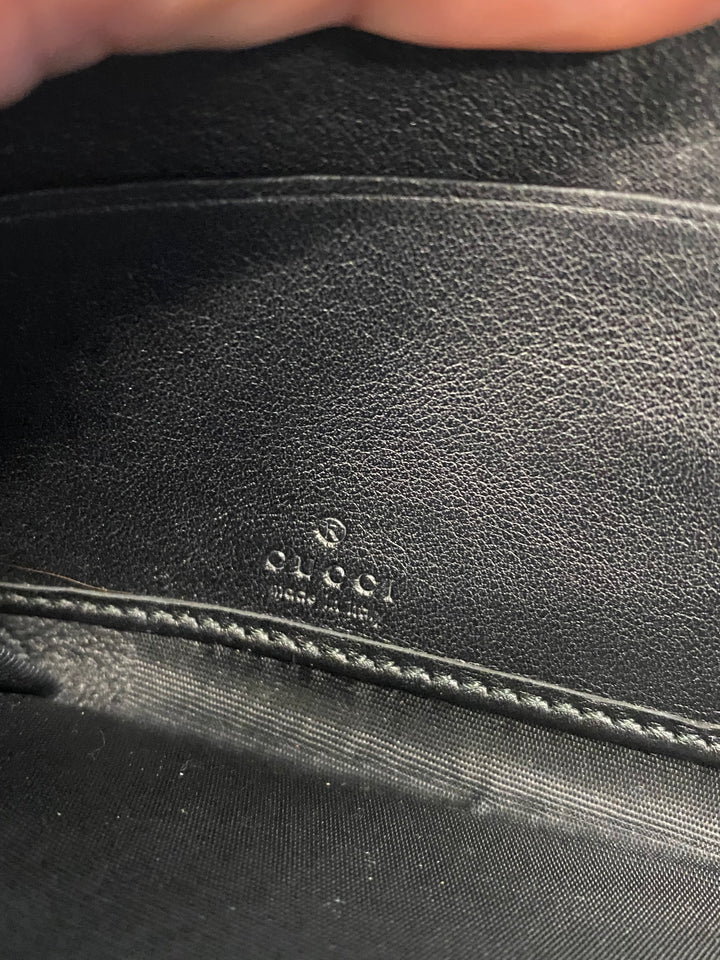 Gucci Black Leather Interlocking GG Zippy Wallet (1784)