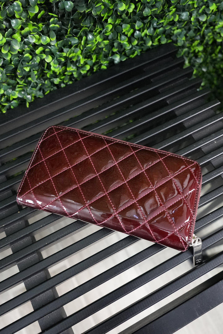 Chanel Burgundy quilted patent zippy