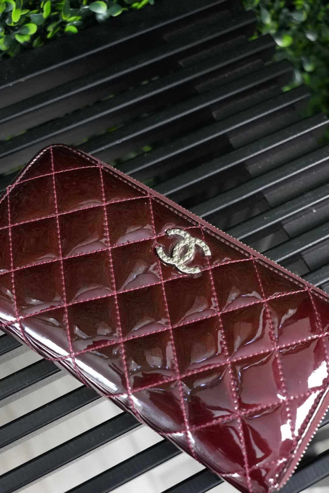 Chanel Burgundy quilted patent zippy