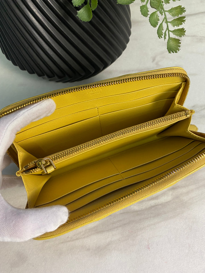 Prada Perforated Saffiano Leather Zippy Wallet (7068)