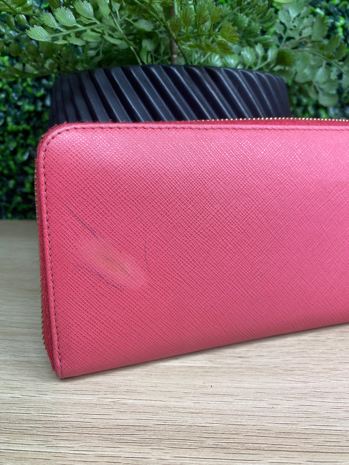 Prada Pink Saffiano Bow Zippy Wallet (4076)